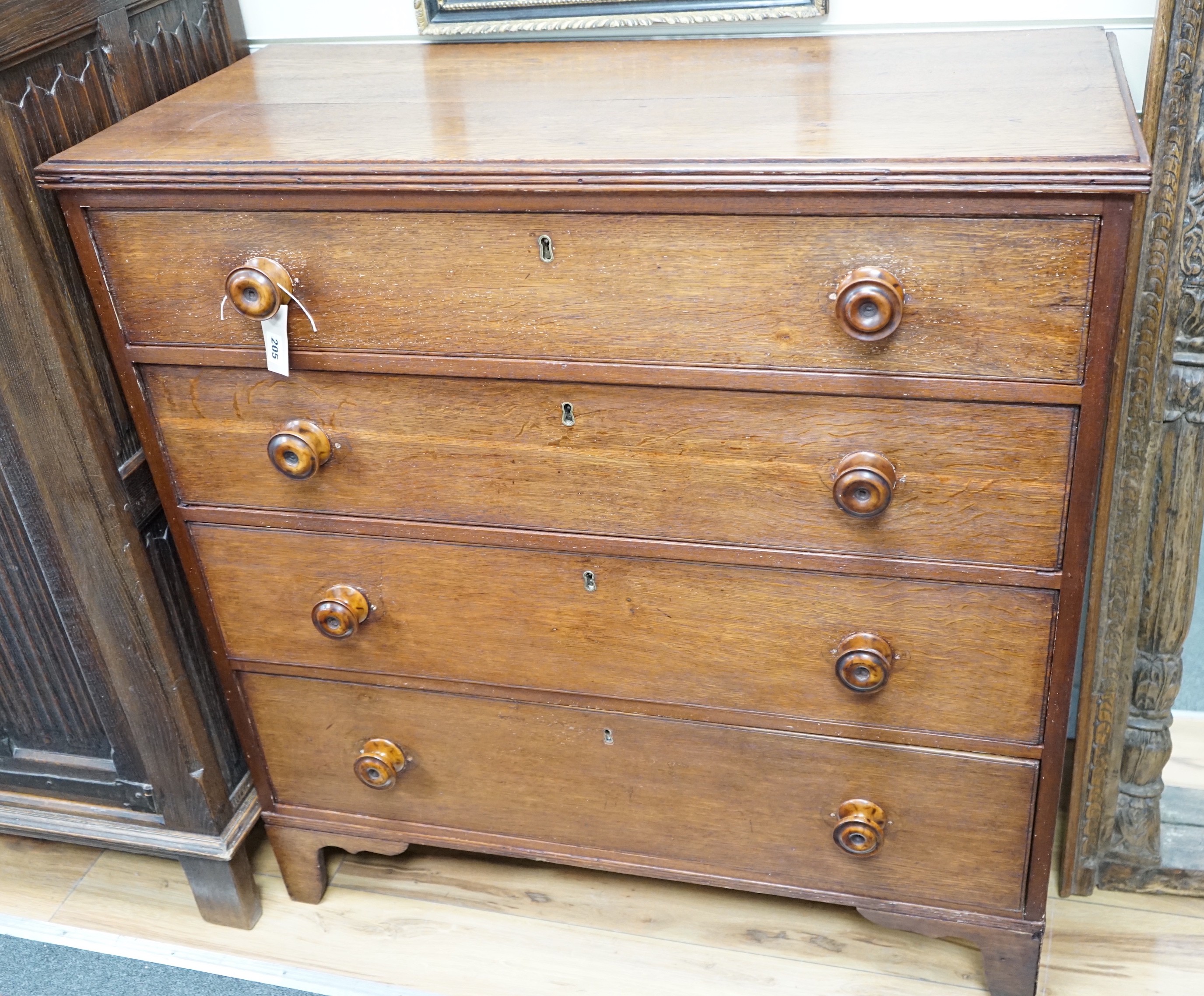 A Regency provincial oak chest of four drawers, width 101cm, depth 46cm, height 105cm